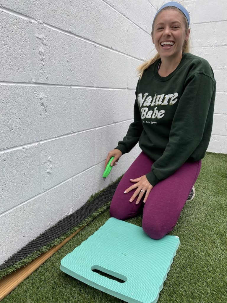 Girl preparing an area for her home gym