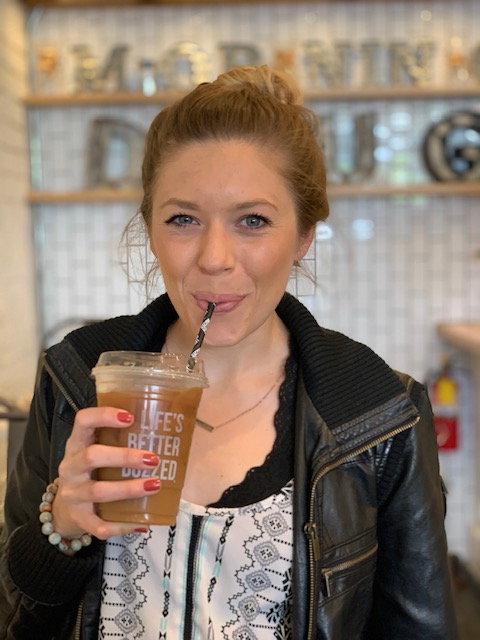 Girl drinking coffee at Better Buzz