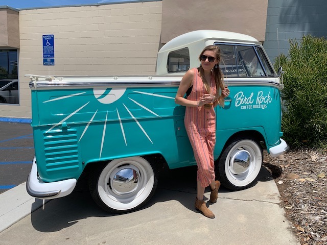 Chelsey Explores standing in front of the Bird Rock coffee truck