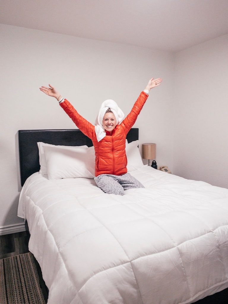 Girl at lodging in Big Bear as part of a winter road trip from San Diego