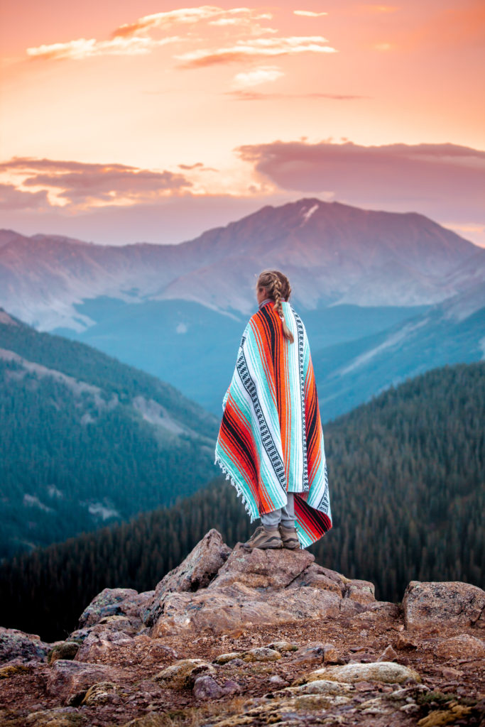 as a first time hiker it is important to wear the proper shoes like the girl in this photo