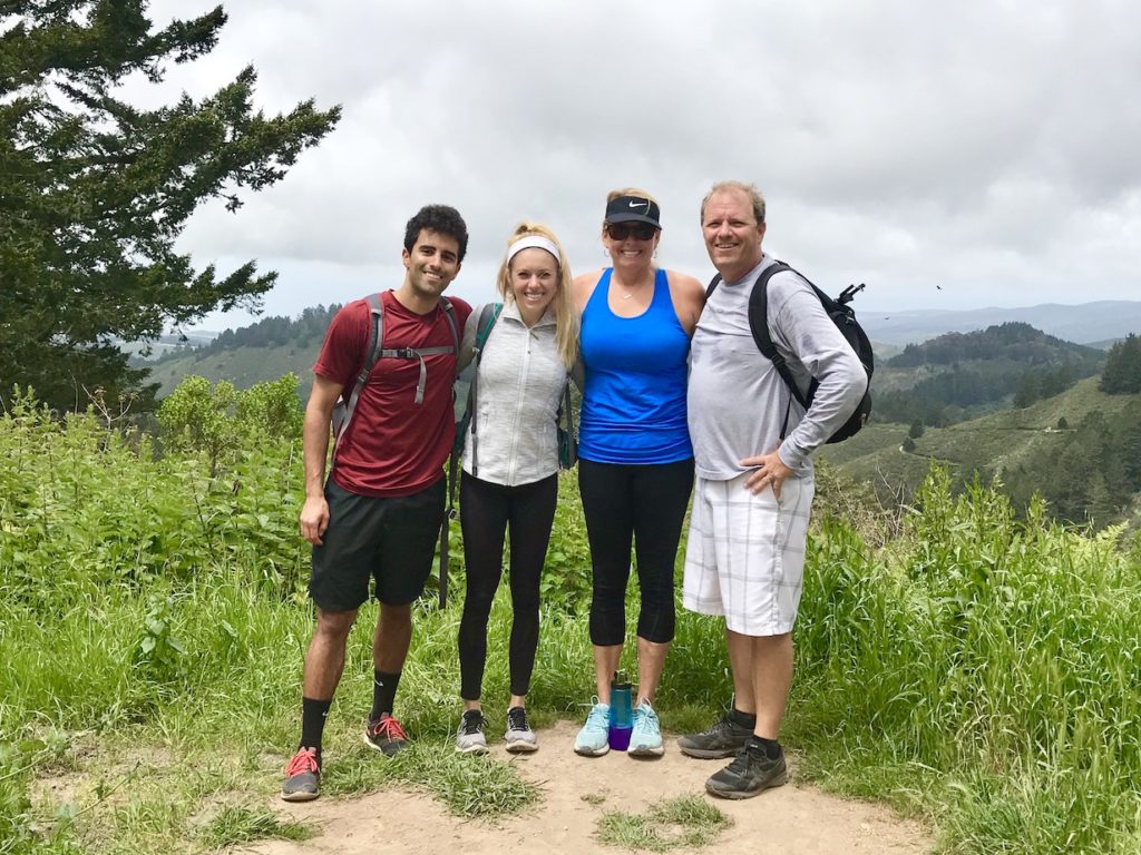 Family of four hiking the King's Mountain Loop in Redwood City