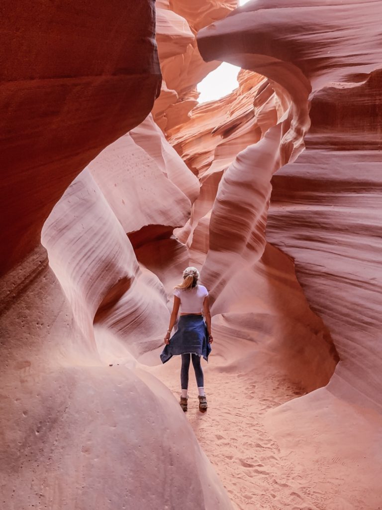 Girls standing in the middle of Antelope Canyon