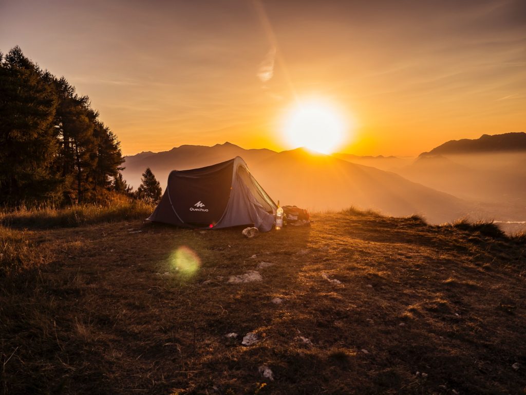 Tent camping at sunset 