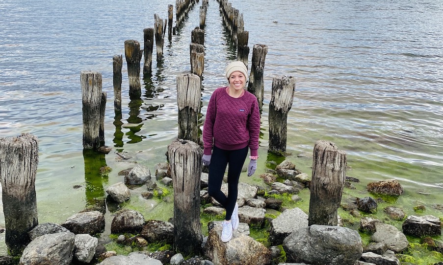 Girl wearing a pink sweater from Patagonia Worn Wear 