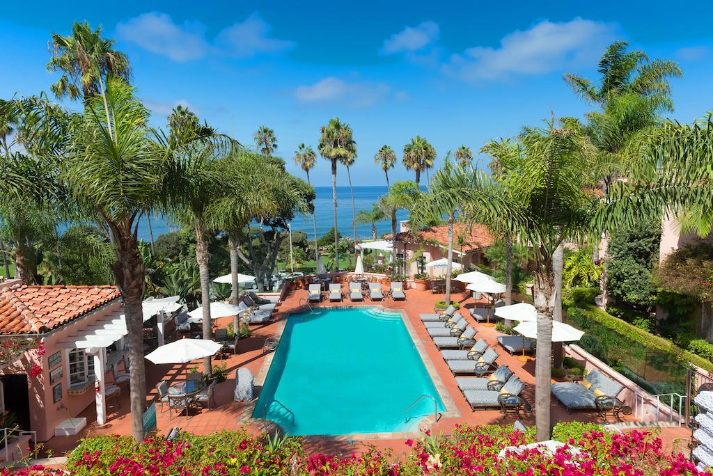 La Valencia Hotel pool with views of the ocean which is one of the most gorgeous hotel pools in San Diego