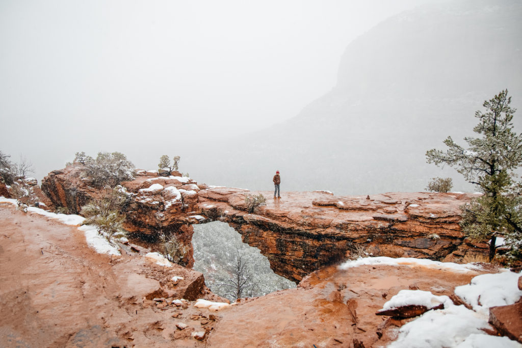 Girl standing on Devil's Bridge in Sedona