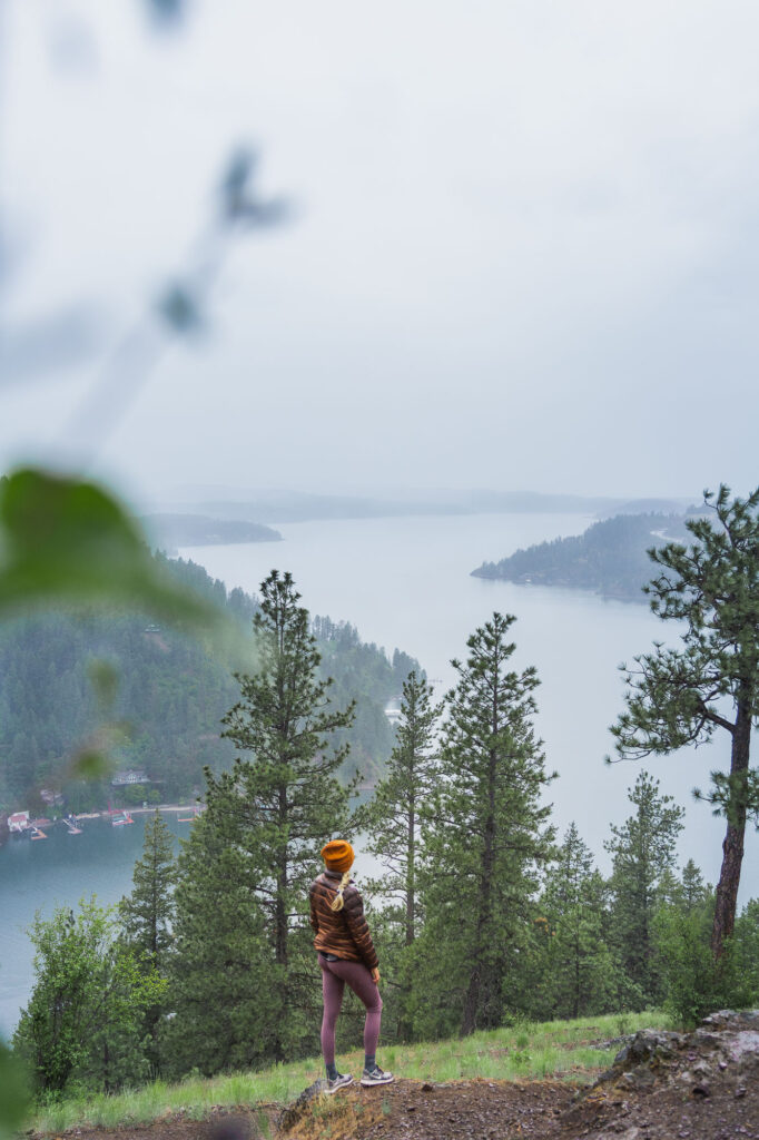 Girls standing on rock on the Mineral Ridge hike which is one of the best things to do in Coeur d’Alene