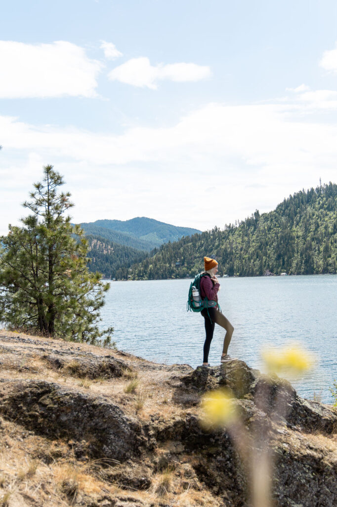 Girl in Idaho with her backpack and Stanley IceFlow water bottle