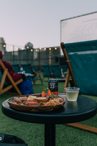 Drinks and food on display atop the Rooftop Cinema Club in downtown San Diego