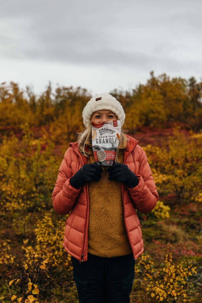 Girl standing in the Fall colors in Iceland