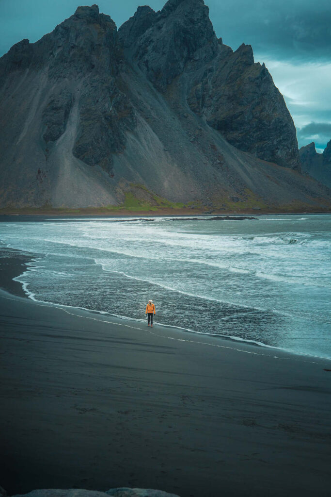 Girl standing on Vestahorn (Stokksnes) beach