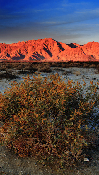 Anza borrego at sunrise with sun shining on mountains