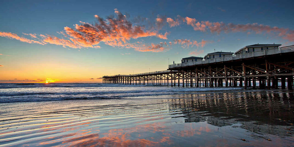 Sunset at Crystal pier in Pacific Beach which is a top San Diego photo spot. 