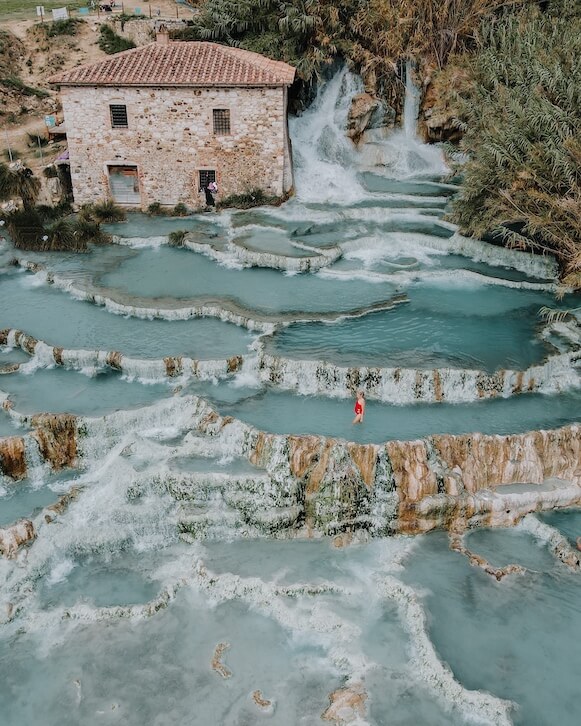 Chelsey Explores in the Saturnia Hot Springs which is in Tuscany