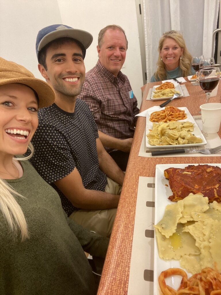 Chelsey Explores and her family smiling after their pasta making class