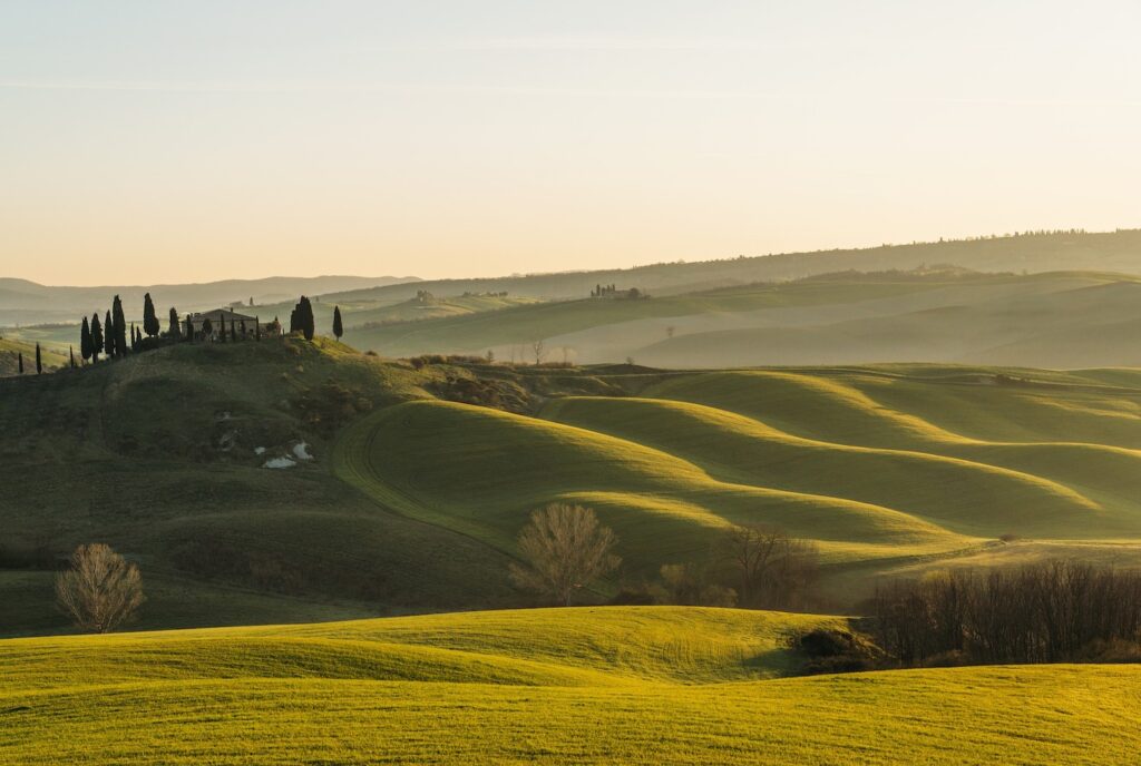 Tuscany rolling hills during sunset