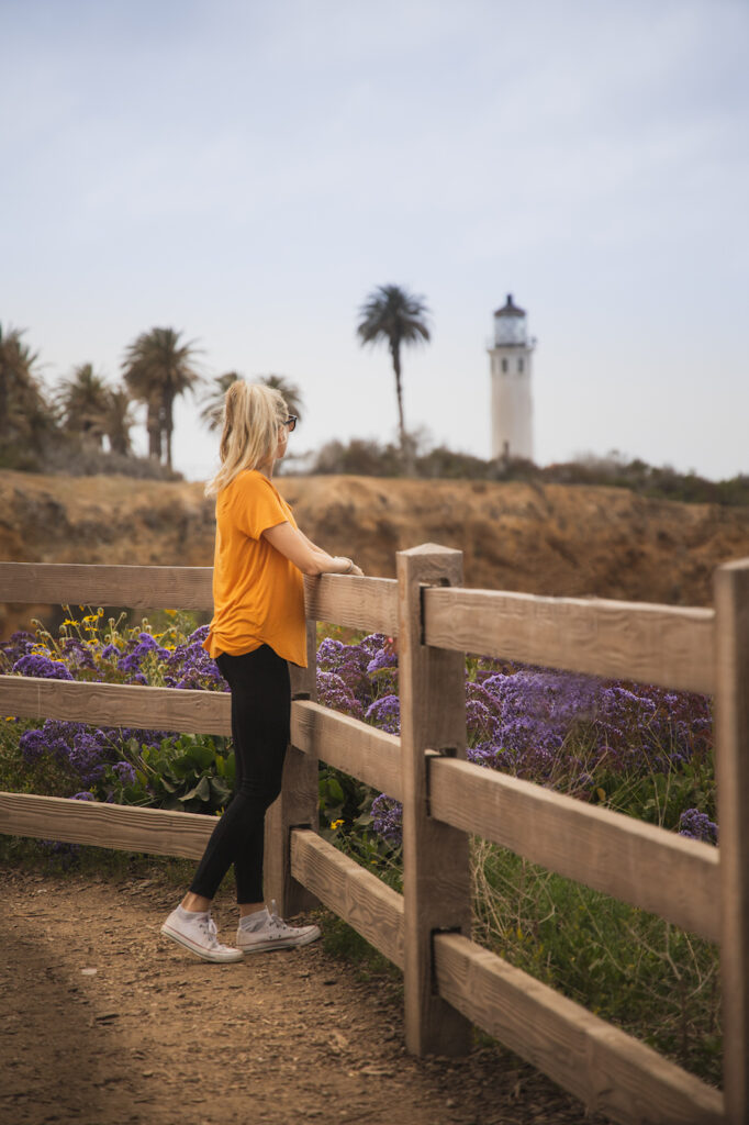 Girl standing in front of the Point Vicente Lighthouse