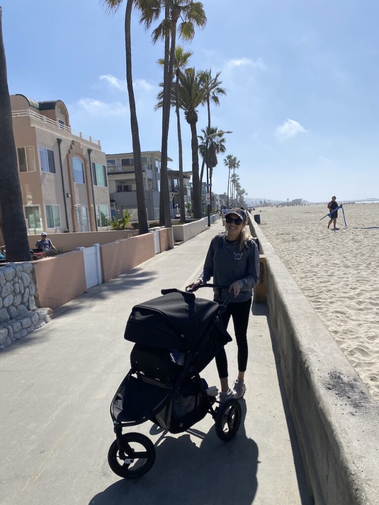 Girl walking along the stroller friendly trail in Mission Beach