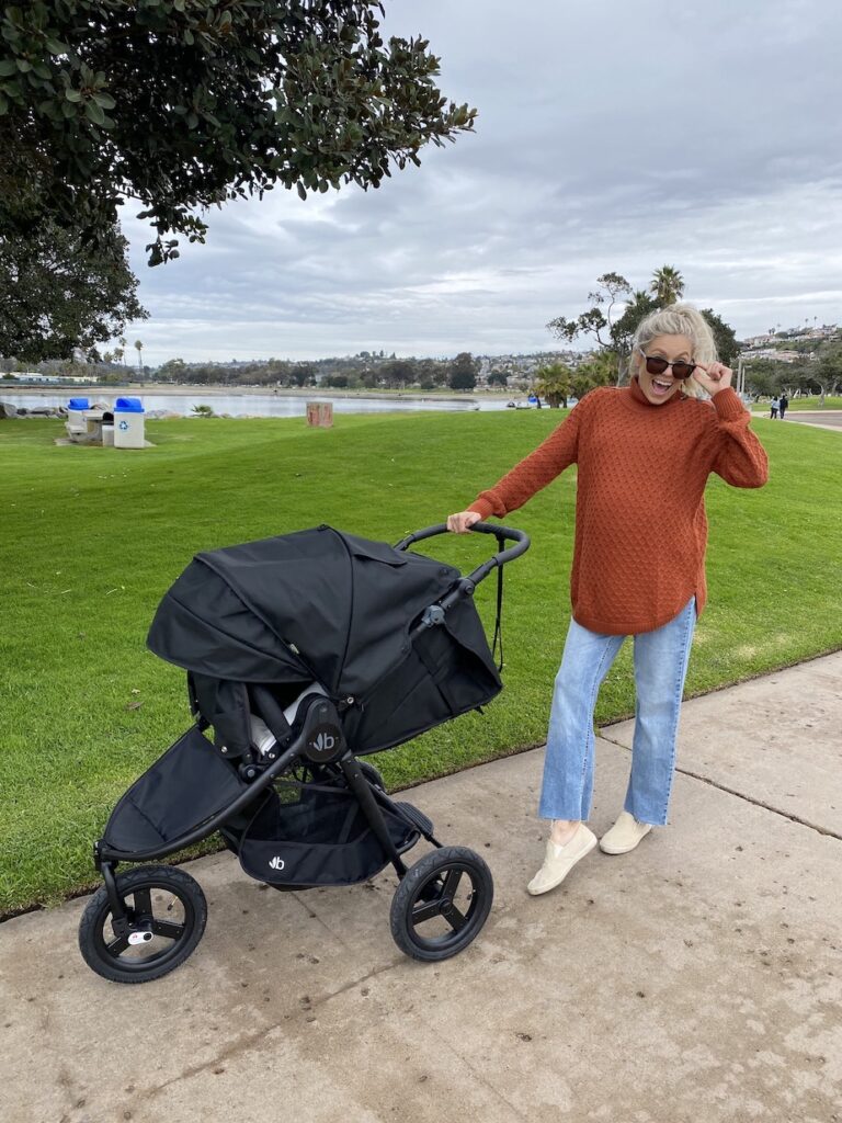 Girl walking her stroller at Mission Bay Park