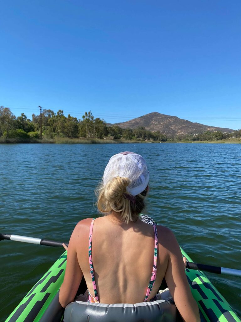 Girl kayaking on Lake Murray in San Diego