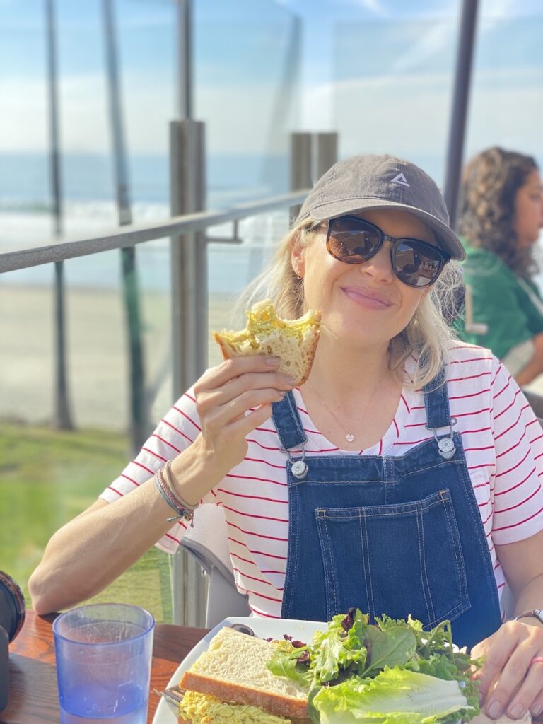 Girl eating at Carolin'es Seaside Cafe