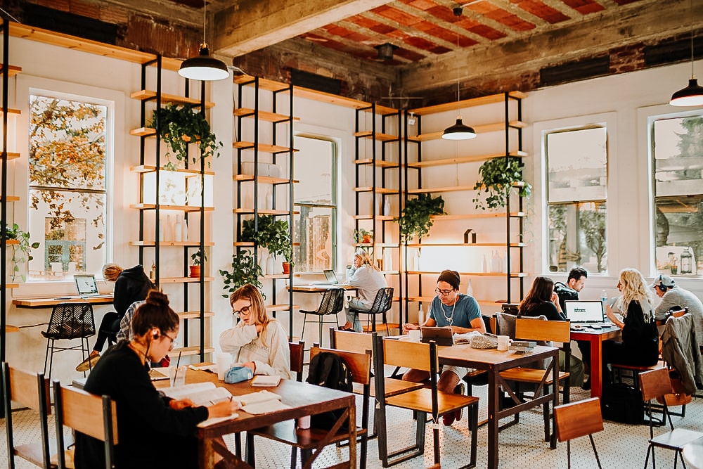 People studying at Moniker which is one of the best study coffee shops in San Diego 