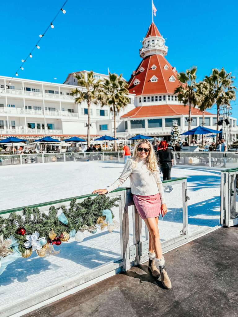 Girl standing in front of ice rink on Coronado Island