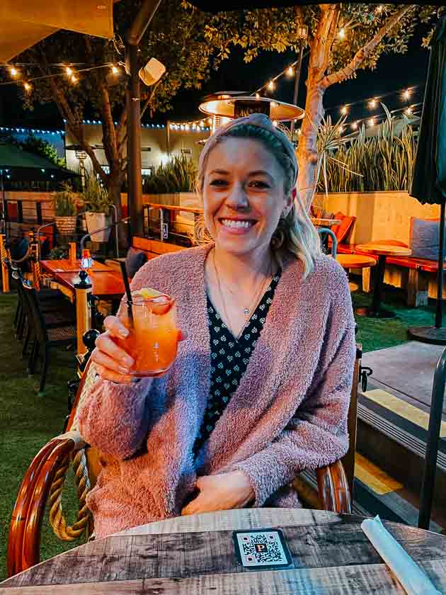 Girl with her cocktail at The Presley in Point Loma