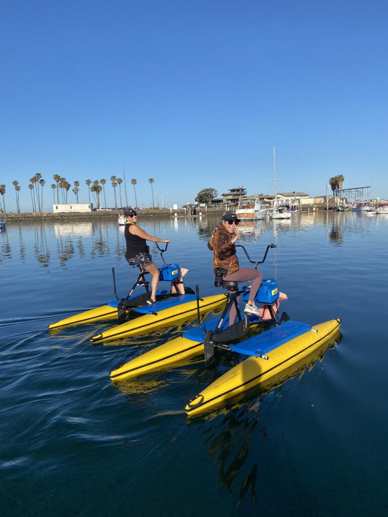 Mom and daughter on a hydrobike in San Diego