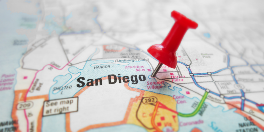 thumb tack pin pointed on san diego on a map