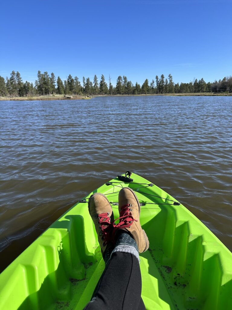 Kayaking on the lake at backland glamping resort in williams, az