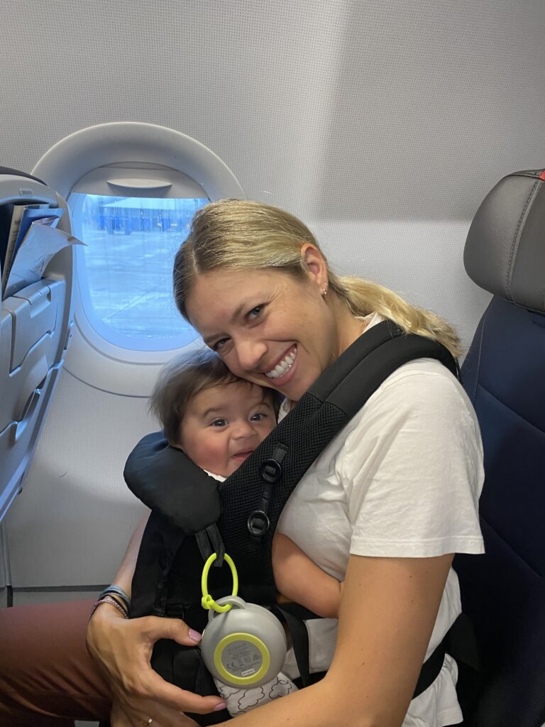Mom traveling on an airplane
